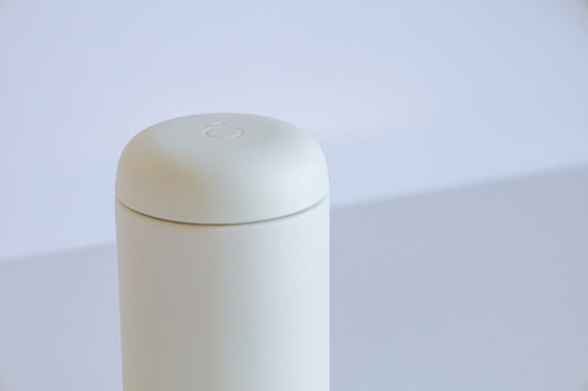 white plastic container on white surface