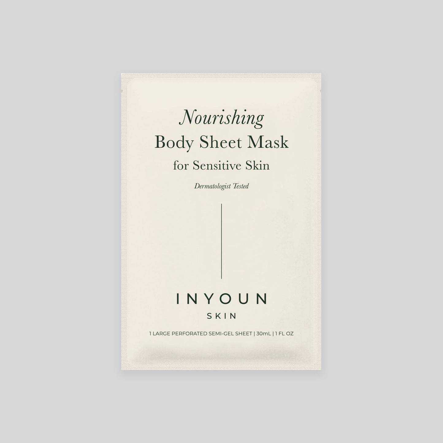 Front view of body sheet mask packet reading Nourishing Body Sheet Mask for Sensitive Skin on light gray background