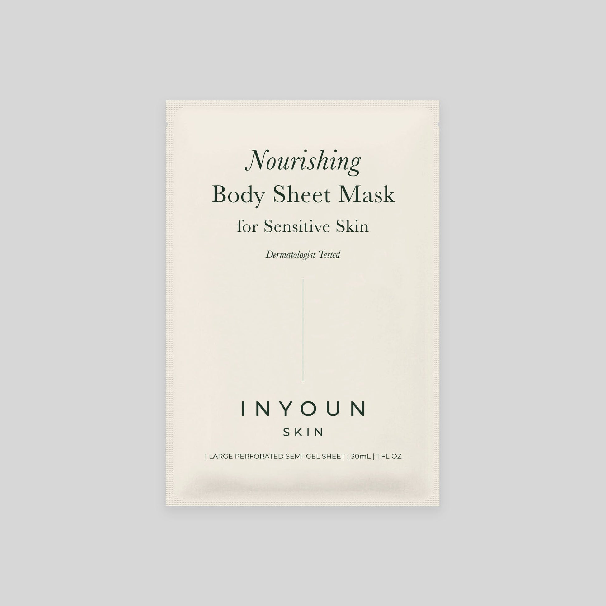 Front view of body sheet mask packet reading Nourishing Body Sheet Mask for Sensitive Skin on light gray background